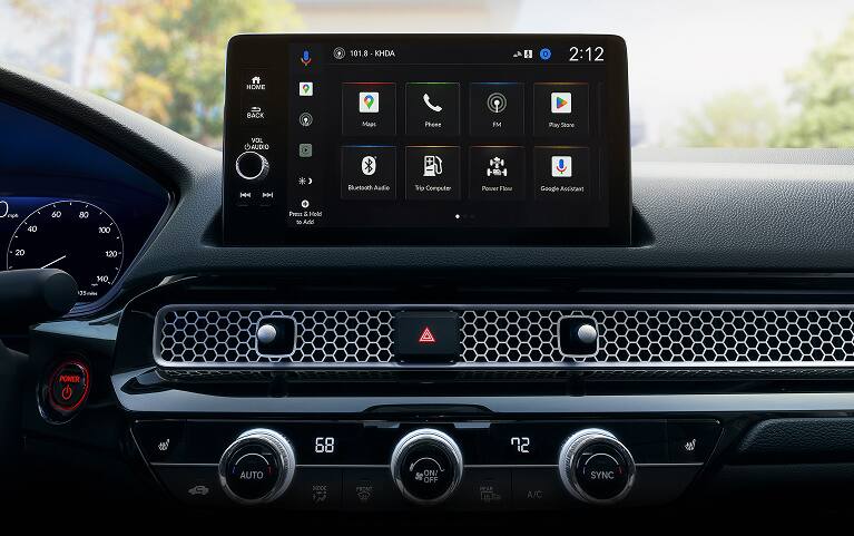 2026 Honda Civic Hatchback Sport Touring Hybrid dashboard with screen displaying Apple CarPlay (Compact Hatchback).