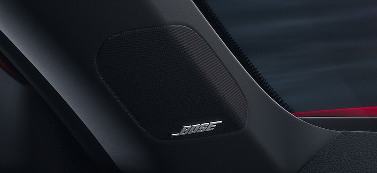 2027 Honda Civic Hatchback Sport Touring Hybrid detail of the Bose premium sound system speakers (Compact Hatchback).